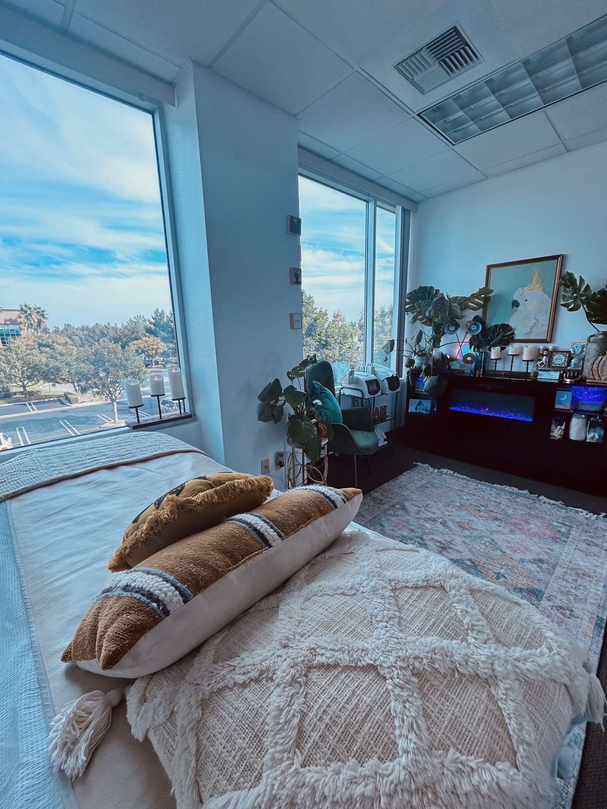 Treatment room at Luna Tropical Esthetics with natural light and plants